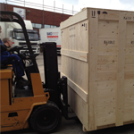 Export Packing to machine base cases, and loading to sea freight container at clients premises