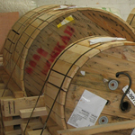 Heavy cable drums packed and secured to softwood cradles designed for air freight shipment